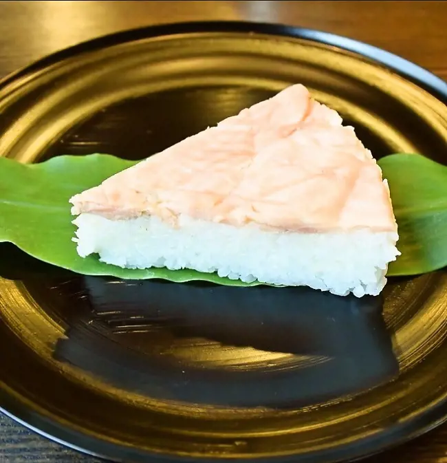 Masu Sushi is a special dish of Toyama, it is pressed with masu salmon and wrapped in bamboo leaves