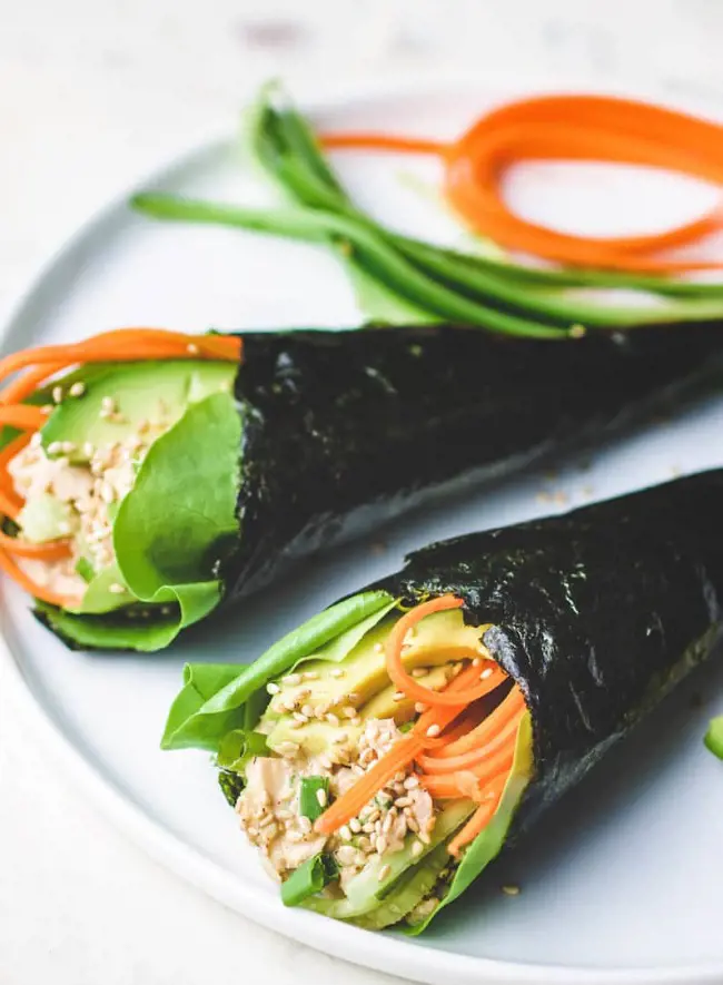 Temaki Sushi is a hand rolled sushi and is wrapped in nori seaweed in coned shaped